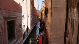 Looking toward st. Mark's down a narrow Venice canal
