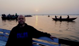 Me on the River Ganges in Varanasi, India at sunrise
