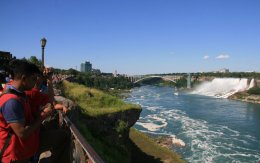 People along the Niagara Parkway looking at the falls