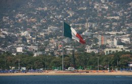 Giant Mexican flag on the beach in Acapulco